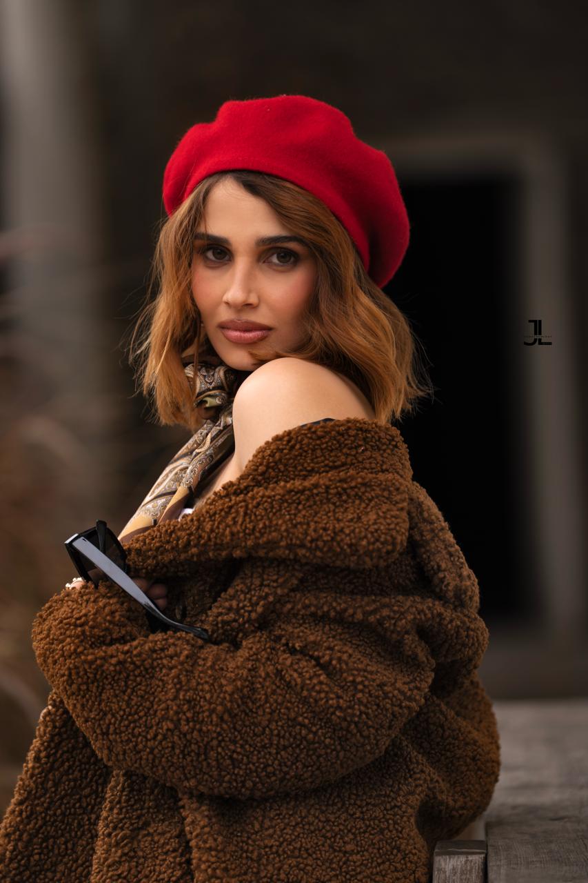 Editorial fashion portrait in a wide brimmed red hat, Toronto fashion photography