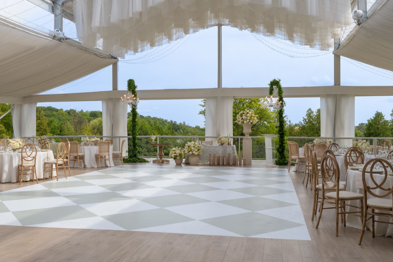 Wedding reception tent garland — The Approach, photographed by Jonathan Levy